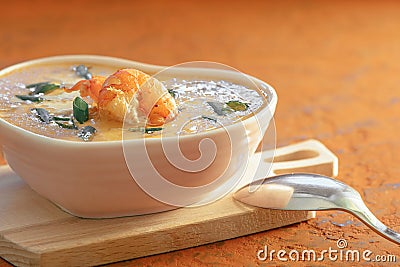 Closeup Gourmet Cream Soup with Shrimp and Onion Stock Photo