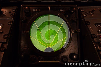 Closeup of green glowing aircraft radar gauge display. Stock Photo
