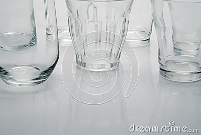 Closeup group of empty drinking glass on white table, object Stock Photo