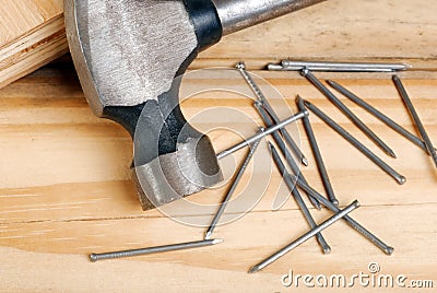 Closeup of hammer and nails Stock Photo