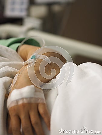 Closeup hand Patients sleep to saline at the hospital ward physical examination admit Stock Photo