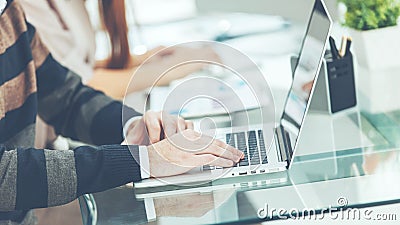 closeup - a hand specialist on laptop keyboard Stock Photo