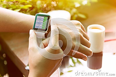 Closeup hand using watch check stock finance Stock Photo