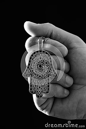 Old hamsa amulet or hand of Fatima Stock Photo