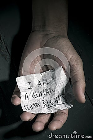 Text I am a human with rights in a piece of paper Stock Photo