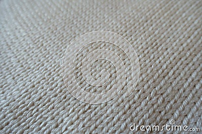 Closeup of handmade plain white stockinette stitch knitwork Stock Photo