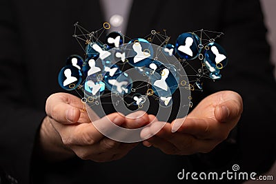 Closeup of hands holding 3D rendered human icons, internet and digital networking concept Stock Photo