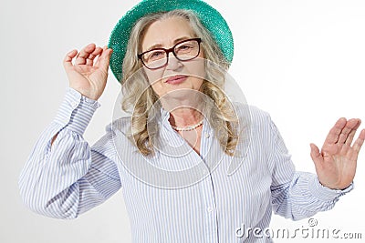 Closeup of happy stylish senior woman in business glasses and summer hat . Positive life living of elderly people. Healthy Stock Photo