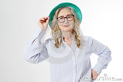 Closeup of happy stylish senior woman in business glasses and summer hat . Positive life living of elderly people. Healthy Stock Photo