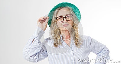 Closeup of happy stylish senior woman in business glasses and summer hat . Positive life living of elderly people. Healthy Stock Photo