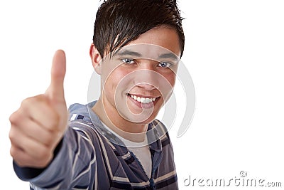 Closeup of a happy young boy with thumb's up sign Stock Photo