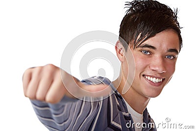 Closeup of a happy young boy with thumb's up sign Stock Photo