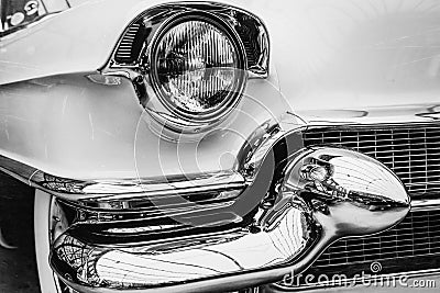 Closeup of the headlights and front bumper on vintage automobile Stock Photo