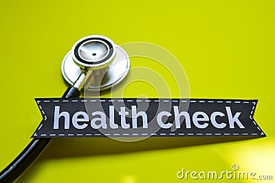 Closeup healthy check with stethoscope concept inspiration on yellow background Stock Photo