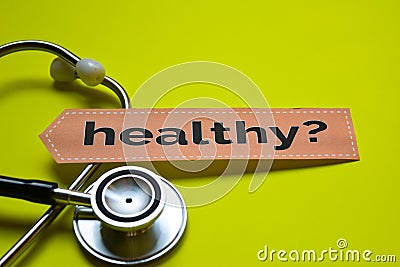 Closeup prevetion cure with stethoscope concept inspiration on yellow backgroundCloseup Healthy with stethoscope concept inspirati Stock Photo