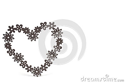 Closeup heart filigree shapes white background concept Stock Photo