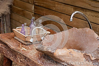 Closeup high angle shot of a luxurious bathroom sink, with bottles next to it Stock Photo