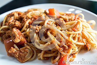 Closeup homemade spagetti with italian red sauce on plate Stock Photo