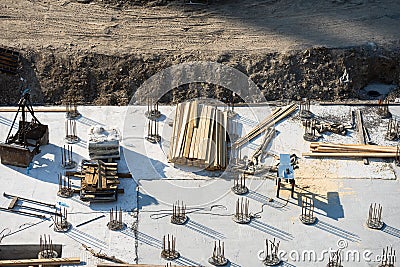 Closeup of house foundation made from concrete shuttering blocks filled with mortar and reinforcement bars Stock Photo