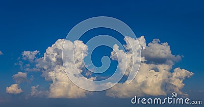 Closeup huge cumulus clouds on blue sky Stock Photo