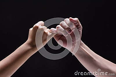 Closeup human hand ,Hook each other,little finger,to be sign and symbol to promise Stock Photo