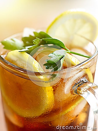 Closeup iced tea with lemon slice and leaf garnish Stock Photo