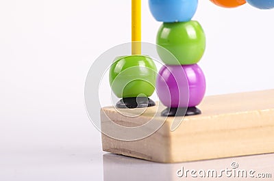 closeup image of beads roller coster ball toy on white background Stock Photo