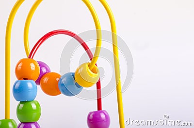 closeup image of beads roller coster ball toy on white background Stock Photo