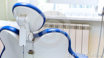 Closeup image of empty dentist chair in dental clinic Stock Photo