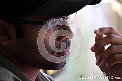 Closeup Indian portrait of a thoughtful man. Stock Photo