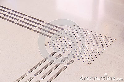 Closeup on Indoor tactile paving foot path for the blind Stock Photo