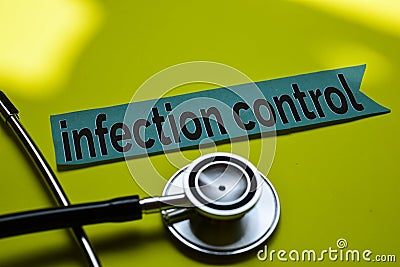 Closeup infection control with stethoscope concept inspiration on yellow background Stock Photo