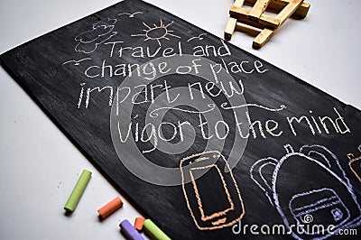 Closeup Inspirational motivating quotes on chalkboard background. Stock Photo