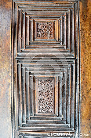 Closeup of islamic ornaments of an old an aged decorated wooden door Stock Photo