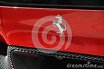 Closeup of italian luxury ferrari car logo Editorial Stock Photo