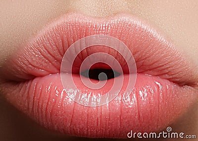 Closeup kiss natural lip makeup. Beautiful plump full lips on female face. Clean skin, fresh make-up. Spa tender lips Stock Photo