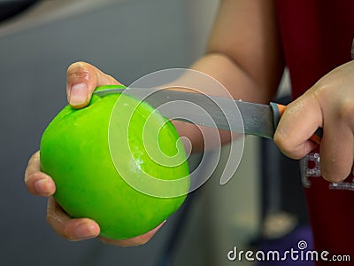 Closeup knife slice on holding pickle guava Stock Photo