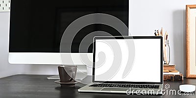 Closeup Laptop computer putting on white working desk. Stock Photo