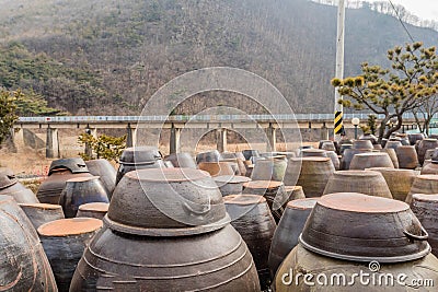 Closeup of large ceramic jars used for fermentation Stock Photo