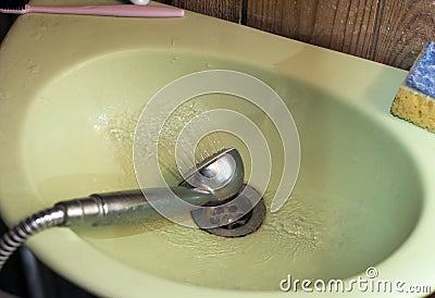Leaking shower hose Stock Photo