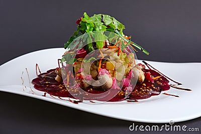 Closeup lenten salad with beetroot, carrot, potato, pickled mushroom Stock Photo