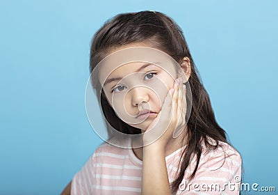Closeup little girl with toothache Stock Photo