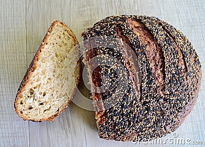 A closeup of a loaf of ancient grain sourdough miche bread Stock Photo