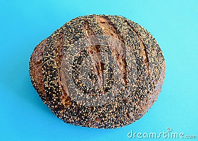 A closeup of a loaf of ancient grain sourdough miche bread Stock Photo