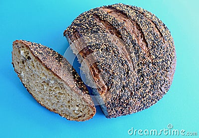 A closeup of a loaf of ancient grain sourdough miche bread Stock Photo