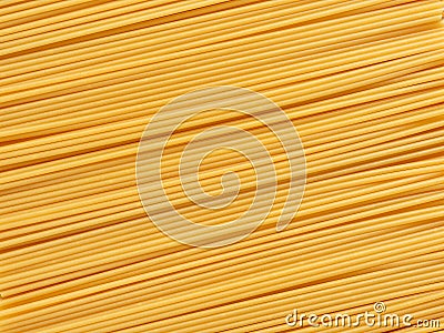 A closeup of a lot of uncooked Italian spaghetti Stock Photo