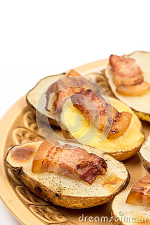 Closeup macro baked potatoes with fried bacon Stock Photo