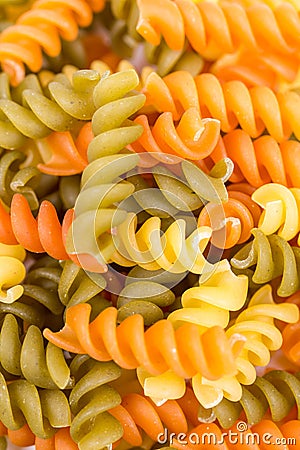 Closeup macro colored macaroni background Stock Photo