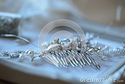 Closeup photo of details, workplace of decorator and creator of wedding imitation jewelry Stock Photo