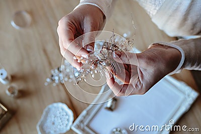 Closeup macro photo of details, workplace of decorator and creator of wedding imitation jewelry. Stock Photo